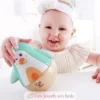 Pingouin culbuto musical turquoise - Bois et plastique - Hape