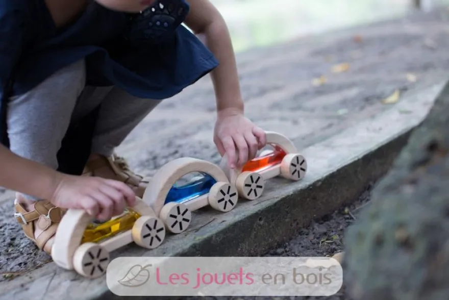 Voiture avec eau colorée rouge - Plan Toys